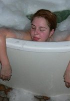 Рыжая красотка позирует в бане 7 фотография Рыжая красотка позирует в бане 7 фотография